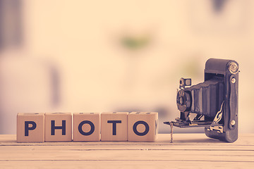 Image showing Photo sign with a vintage camera