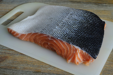 Image showing piece of salmon on a cutting board