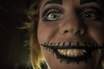 Image showing Horrible girl with scary mouth and eyes