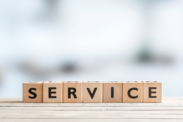 Image showing Service sign on a wood table