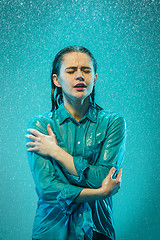 Image showing The portrait of young beautiful woman in the rain