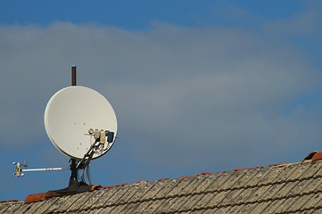 Image showing Satellite dish on a roof