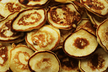 Image showing lot of rosy pancakes close up