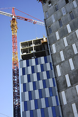 Image showing building  with crane against the blue sky