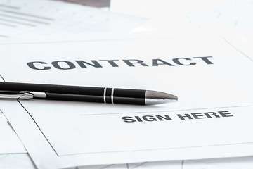 Image showing Black pen on a contract