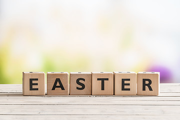 Image showing Easter sign on a wooden table