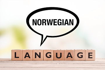 Image showing Norwegian language lesson sign on a table