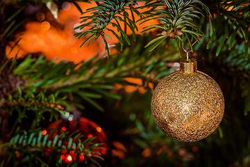 Image showing Glittering Xmas bauble in gold