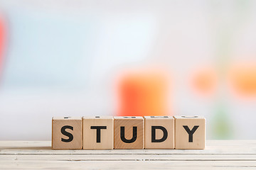 Image showing Study sign on a wooden table