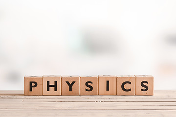 Image showing Physics sign on a desk