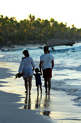 Image showing Family walking on a beach