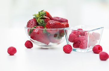 Image showing close up of ripe red strawberries and raspberries