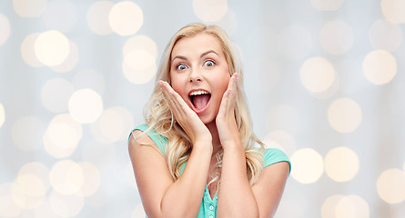 Image showing surprised smiling young woman or teenage girl