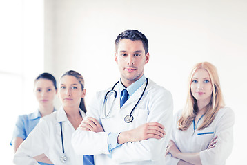 Image showing male doctor in front of medical group