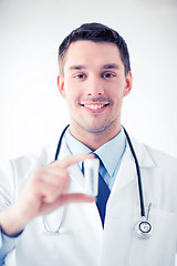 Image showing young male doctor with empty test-tube