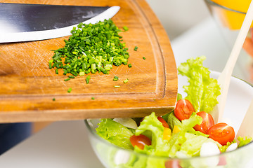 Image showing close up of chopped onion and vegetable salad