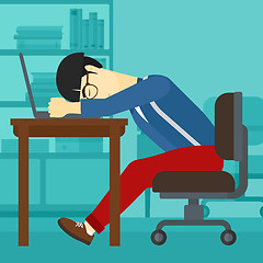 Image showing Man sleeping on workplace.