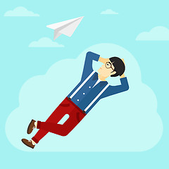 Image showing Businessman relaxing on cloud.