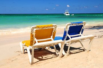 Image showing Chairs on sandy tropical beach