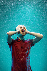 Image showing The portrait of young man in the rain