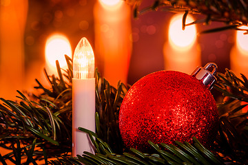 Image showing Xmas lights and a red bauble