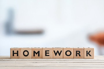 Image showing Homework message on a table