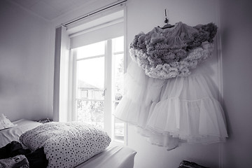 Image showing Dress haning in a bedroom