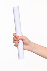 Image showing The cylinder female hands on white background