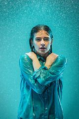 Image showing The portrait of young beautiful woman in the rain