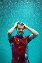 Image showing The portrait of young man in the rain