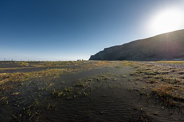 Image showing Deserted shore with black sand