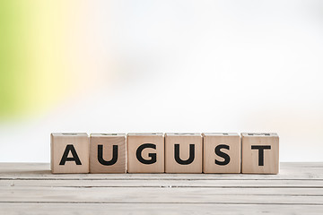 Image showing August sign on wooden cubes