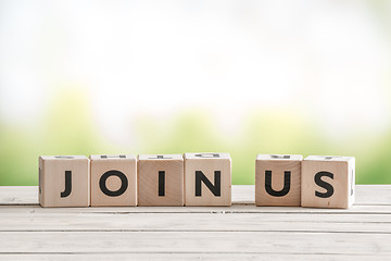 Image showing Join us sign on wooden cubes