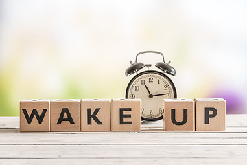 Image showing Wake up message with a classic alarm clock