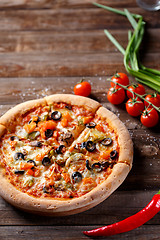 Image showing Pizza with tomato, mushroom and olives