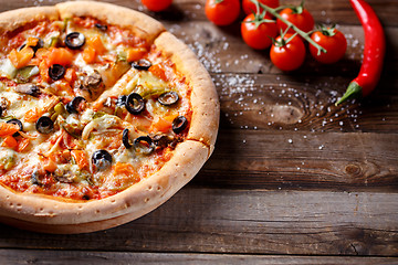 Image showing Vegeterian pizza with mushrooms and olives