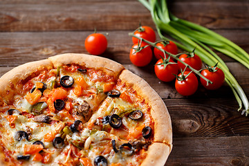 Image showing Pizza with tomato, mushroom and olives