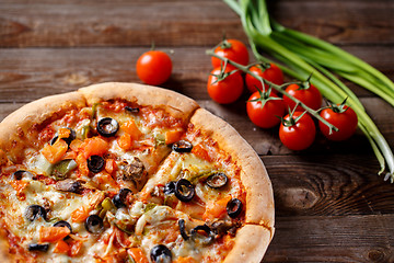 Image showing Pizza with tomato, mushroom and olives