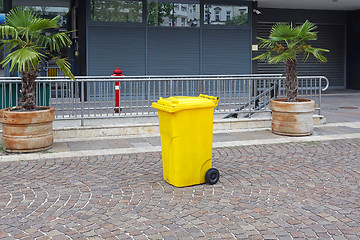 Image showing Yellow Plastic Garbage Bin