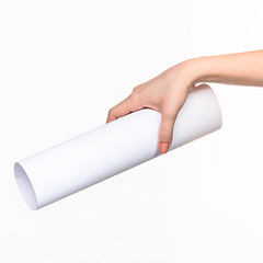 Image showing The cylinder female hands on white background