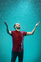 Image showing The portrait of young man in the rain