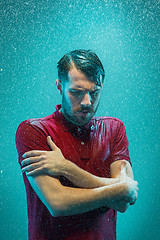 Image showing The portrait of young man in the rain