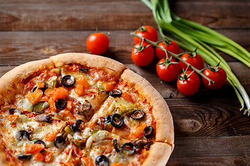 Image showing Pizza with tomato, mushroom and olives