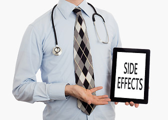 Image showing Doctor holding tablet - Side effects