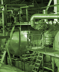 Image showing Equipment, cables and piping as found inside of a modern industr