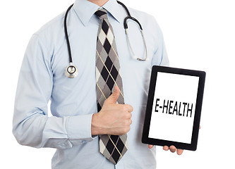 Image showing Doctor holding tablet - E-Health