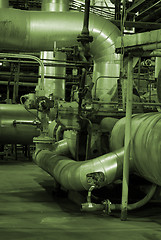 Image showing Equipment, cables and piping as found inside of a modern industr