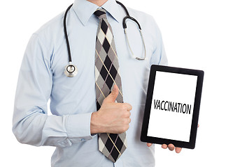 Image showing Doctor holding tablet - Vaccination