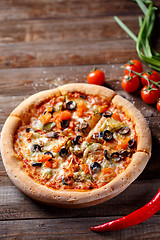 Image showing Pizza with tomato, mushroom and olives