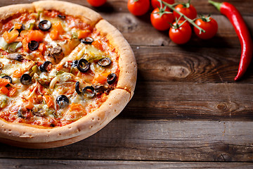 Image showing Vegeterian pizza with mushrooms and olives